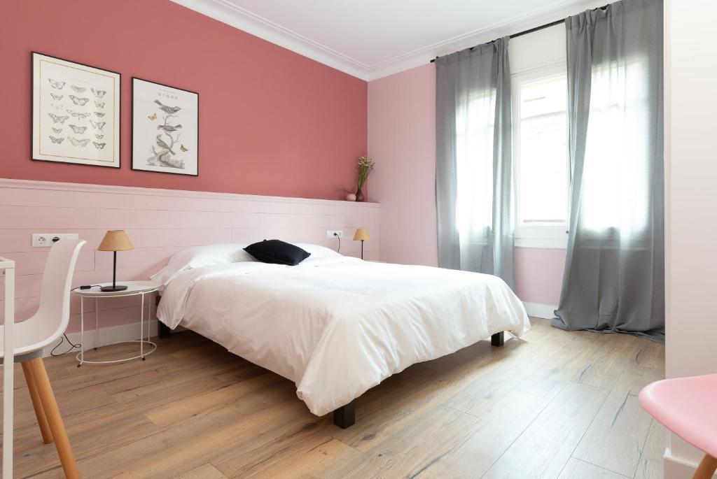 Postel nebo postele na pokoji v ubytování Casa Cosi - Eixample 5