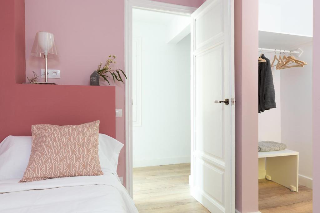 Postel nebo postele na pokoji v ubytování Casa Cosi - Eixample 5