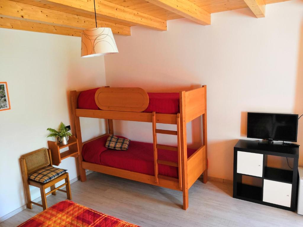 Postel nebo postele na pokoji v ubytování Agriturismo Val Codera