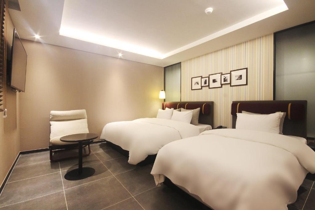 Brown Dot Hotel Seomyeonにあるベッド