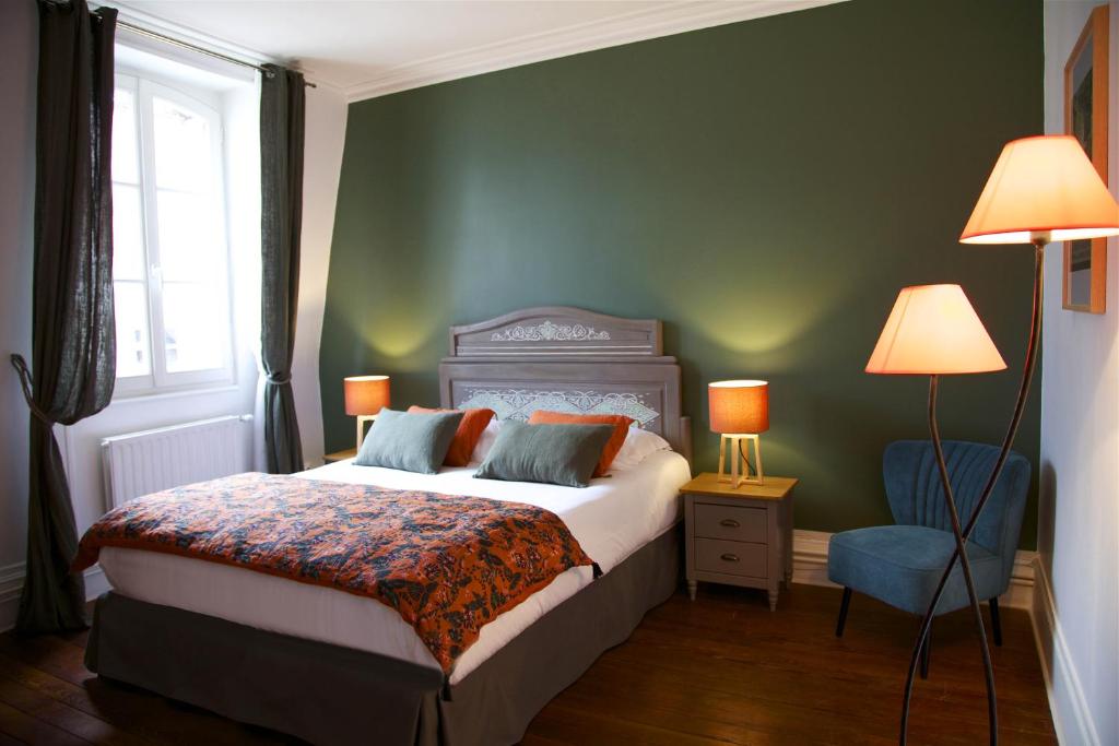 Postel nebo postele na pokoji v ubytování La bohème - Chambres d’hôtes