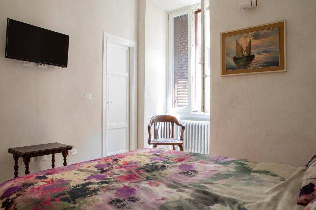 Posteľ alebo postele v izbe v ubytovaní CasaLeone