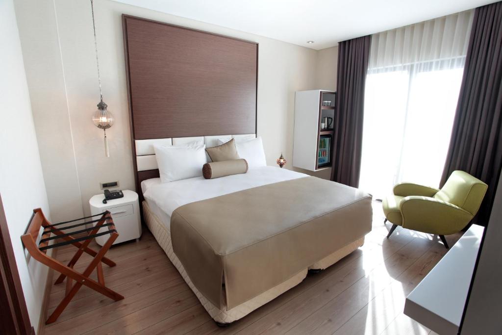 Postel nebo postele na pokoji v ubytování Istanbul Dora Hotel