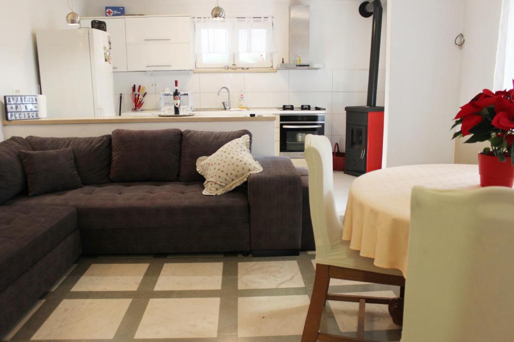 Kuchyň nebo kuchyňský kout v ubytování Apartment Pino