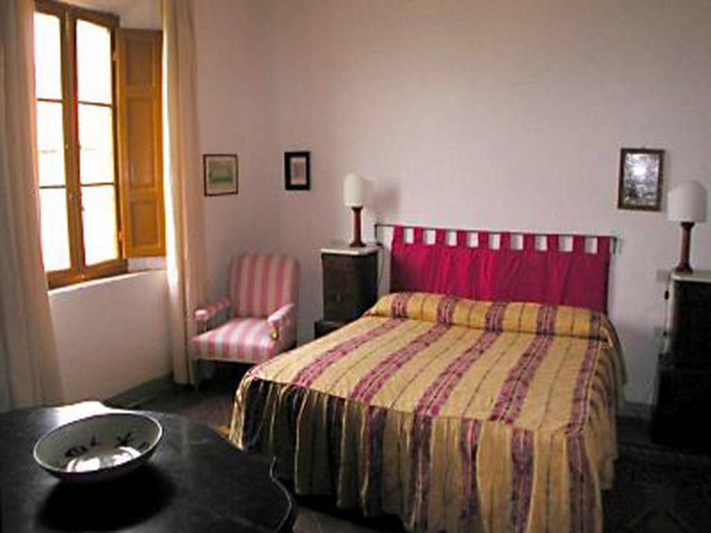 Łóżko lub łóżka w pokoju w obiekcie Castello di Grotti