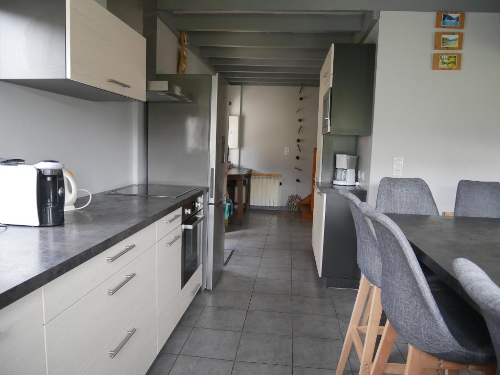 Kuchyň nebo kuchyňský kout v ubytování spa et sauna