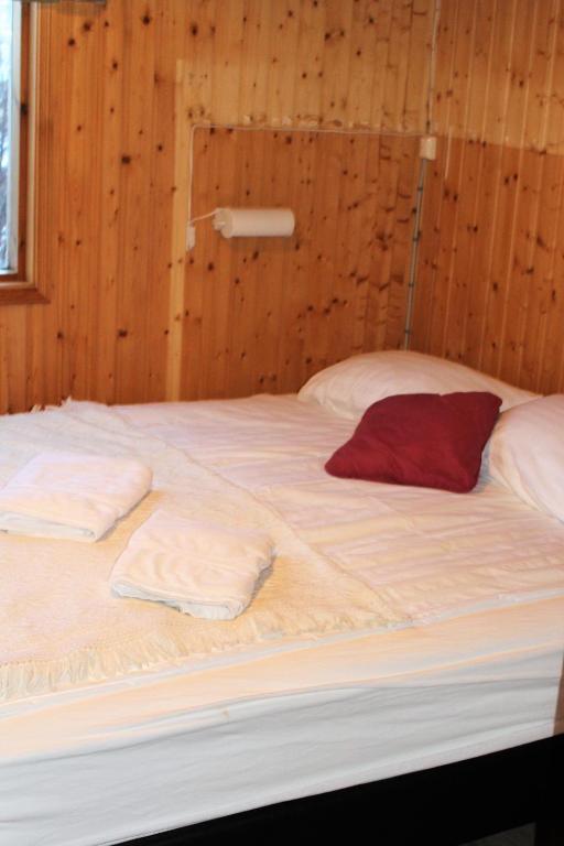 Postel nebo postele na pokoji v ubytování Hrísmóar