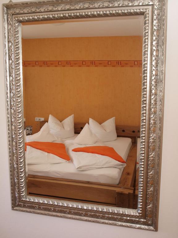 Postel nebo postele na pokoji v ubytování Hotel Restaurant Peterle
