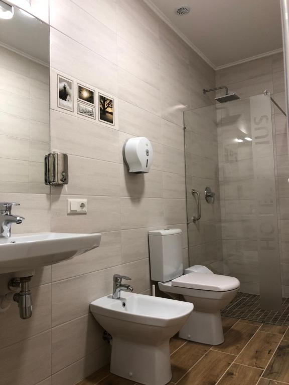 Koupelna v ubytování Hotel Bonus