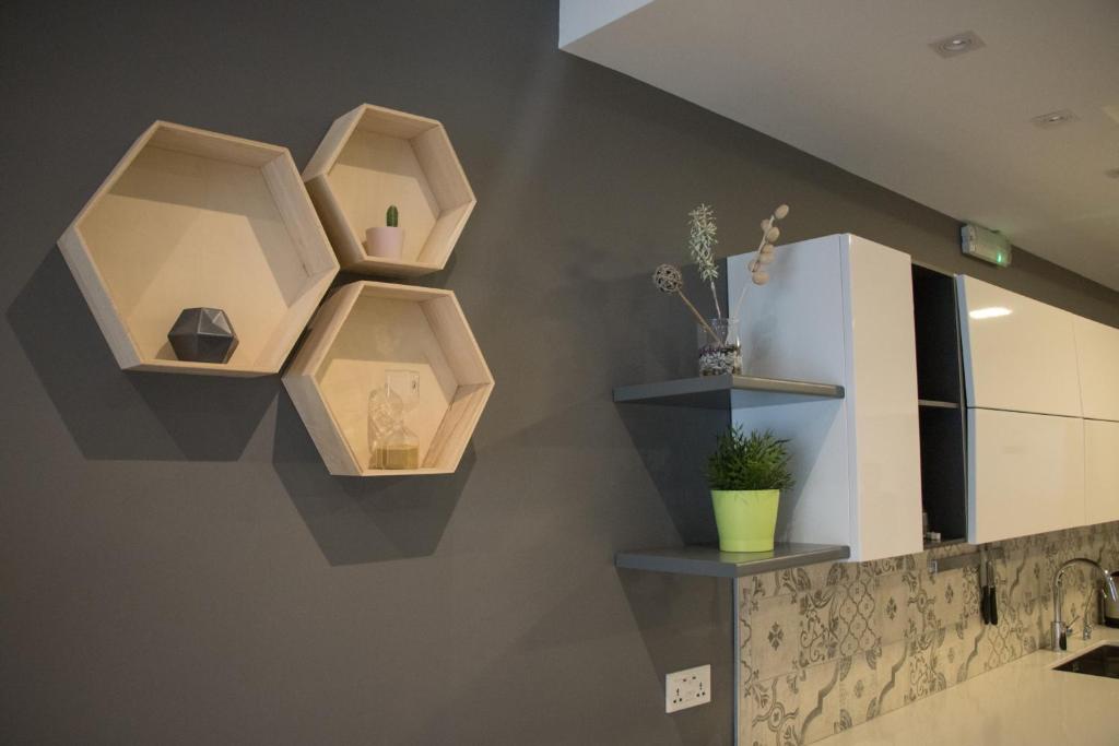 Kuchyň nebo kuchyňský kout v ubytování Sunshine Suites