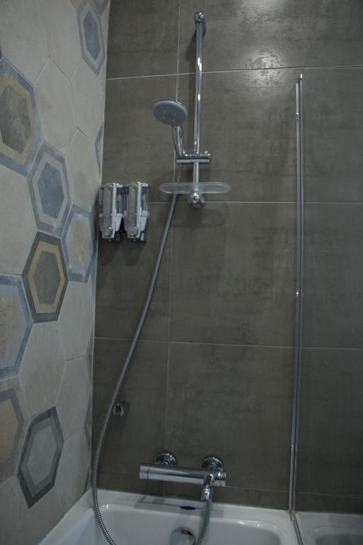 Koupelna v ubytování Sunshine Suites