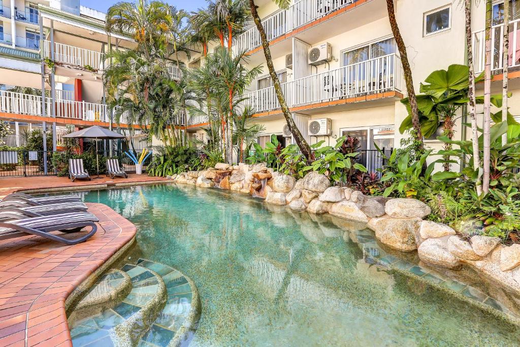 The swimming pool at or close to Coral Tree Inn