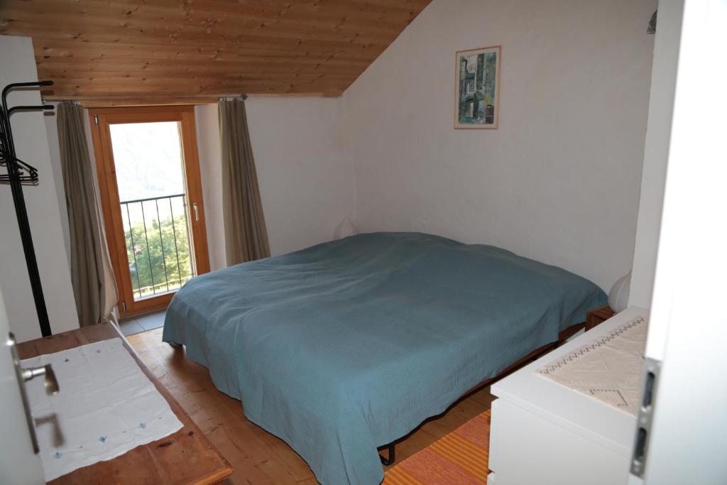 Postel nebo postele na pokoji v ubytování Casa Flora