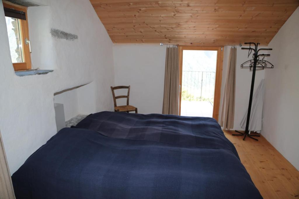 Postel nebo postele na pokoji v ubytování Casa Flora