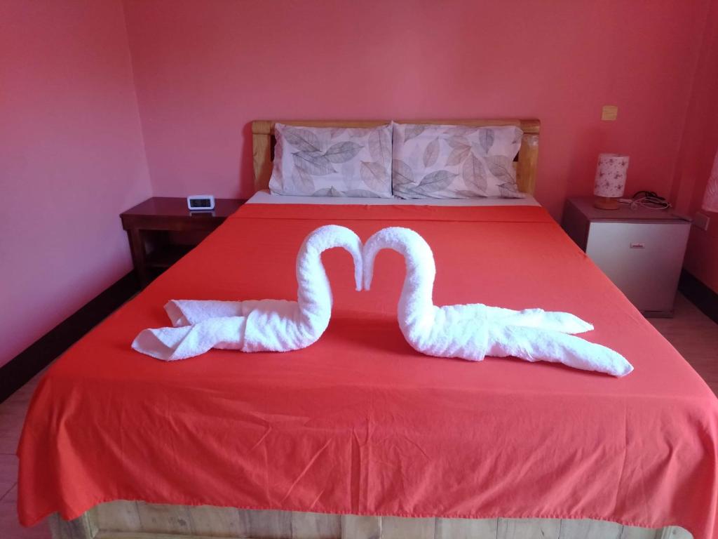 Postel nebo postele na pokoji v ubytování Stella'z guesthouse