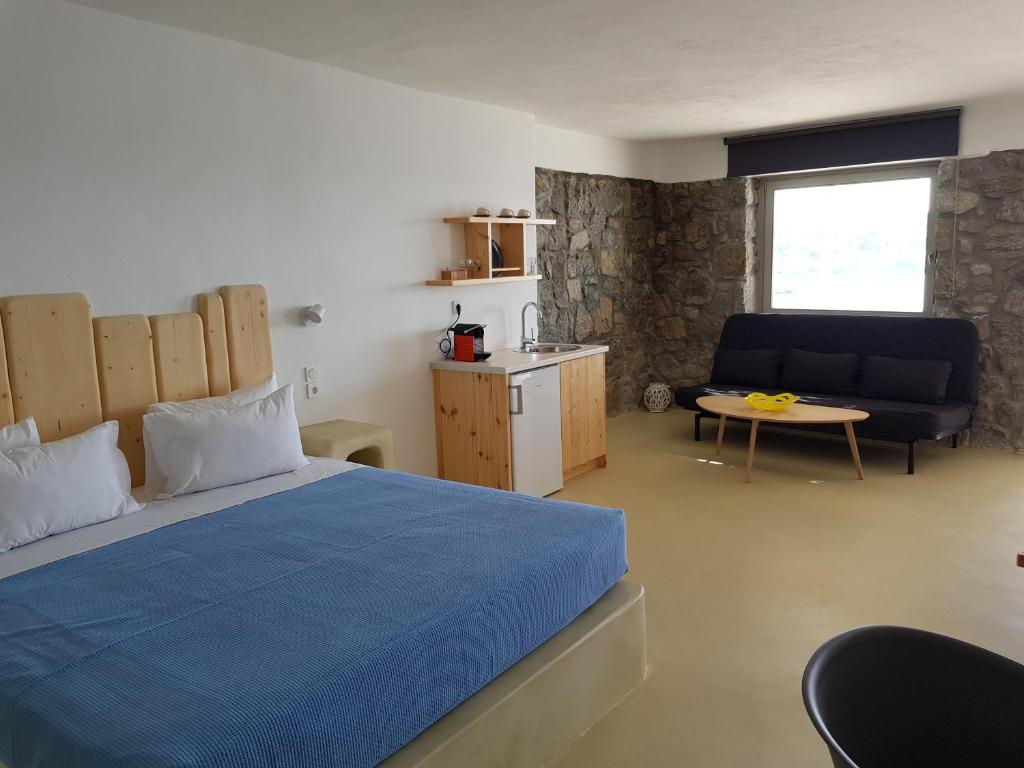 Postel nebo postele na pokoji v ubytování Mykonos Azure