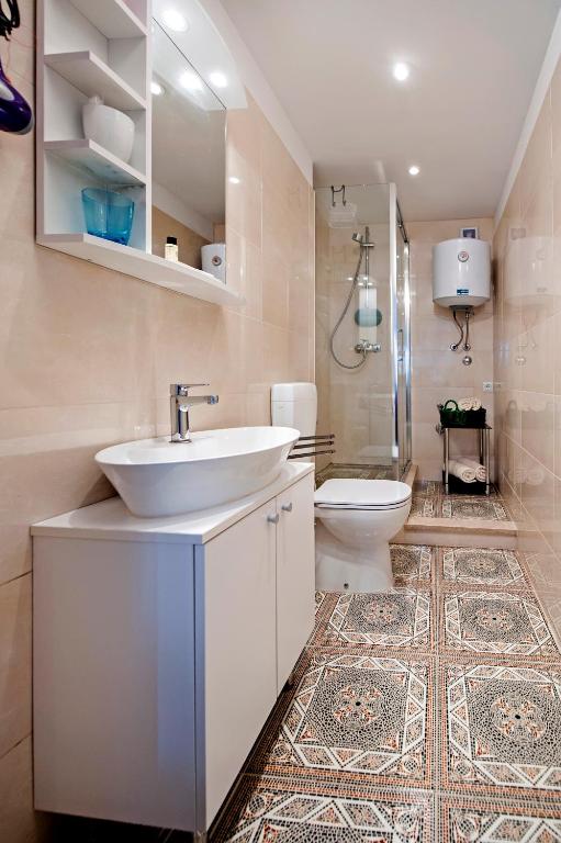 Łazienka w obiekcie Apartman Delfin