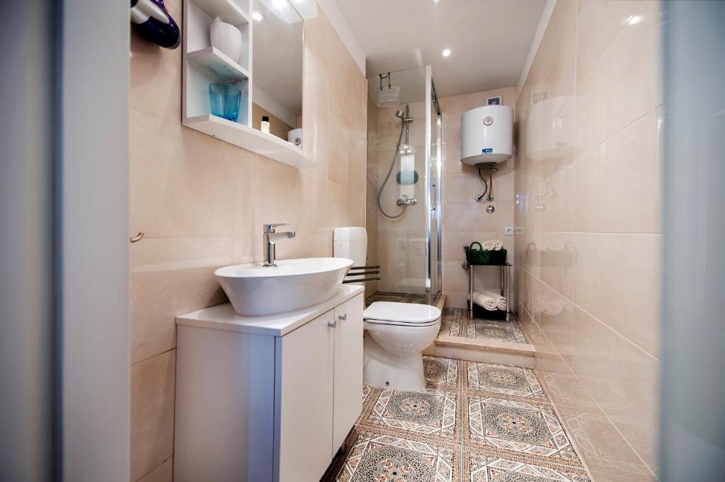 Łazienka w obiekcie Apartman Delfin