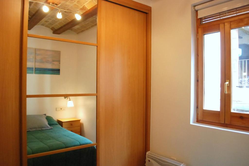 Postel nebo postele na pokoji v ubytování Vlc Apartaments