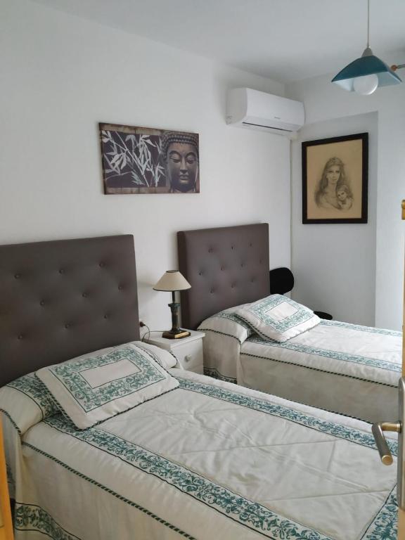 Postel nebo postele na pokoji v ubytování Habitaciones privadas Alicante centro