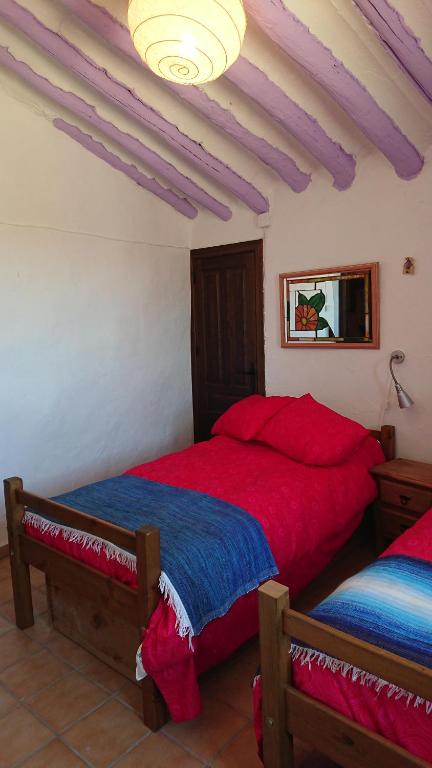 Tempat tidur dalam kamar di Mirador Del Vallejuelo