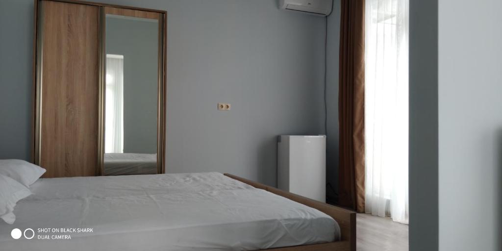 Postel nebo postele na pokoji v ubytování Guest House Palma