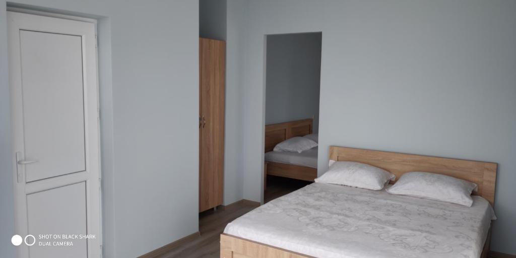 Postel nebo postele na pokoji v ubytování Guest House Palma