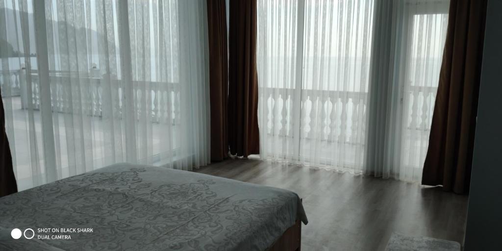 Postel nebo postele na pokoji v ubytování Guest House Palma