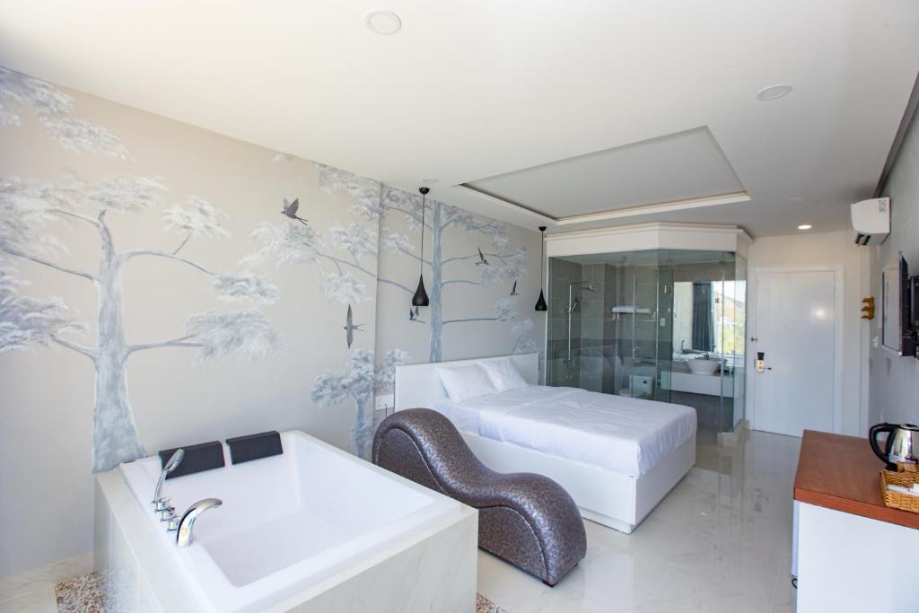 Postel nebo postele na pokoji v ubytování Romely Hotel Nha Trang