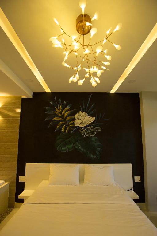 Postel nebo postele na pokoji v ubytování Romely Hotel Nha Trang