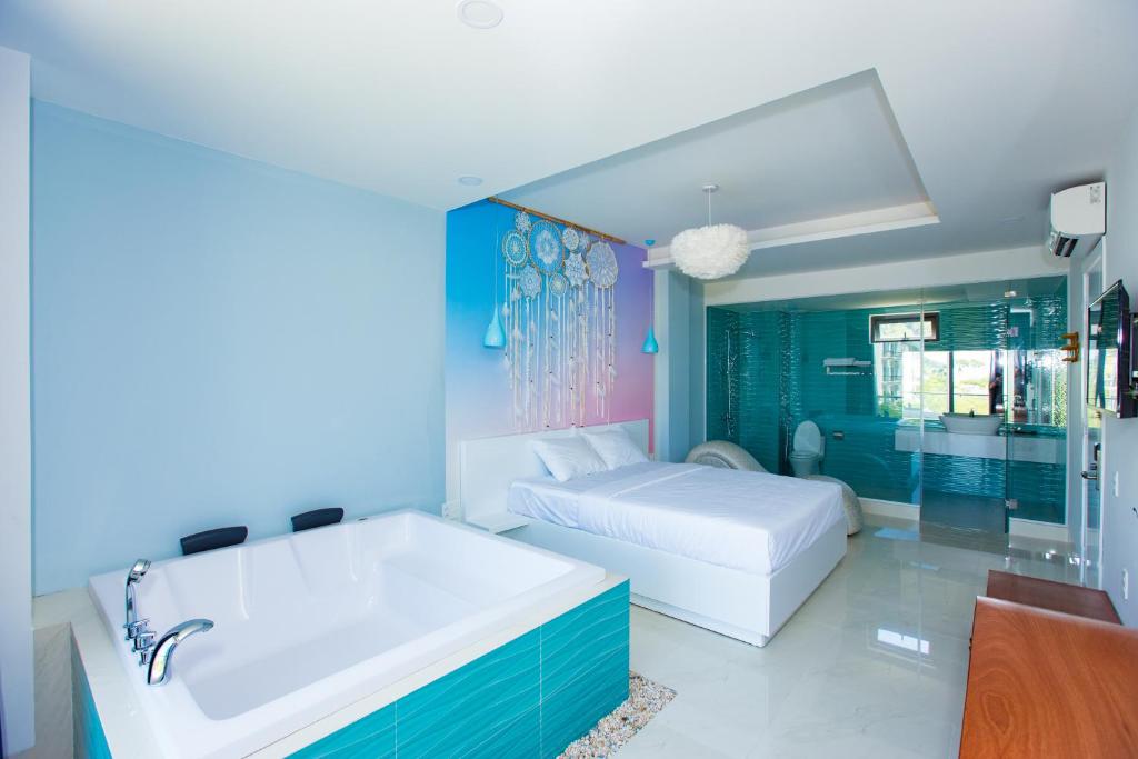 Postel nebo postele na pokoji v ubytování Romely Hotel Nha Trang