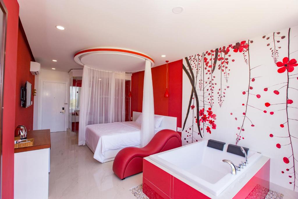 Postel nebo postele na pokoji v ubytování Romely Hotel Nha Trang
