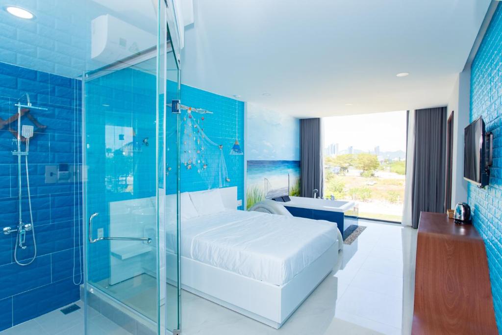 Postel nebo postele na pokoji v ubytování Romely Hotel Nha Trang
