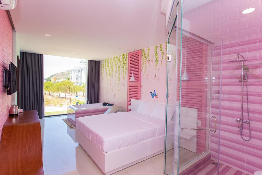 Postel nebo postele na pokoji v ubytování Romely Hotel Nha Trang
