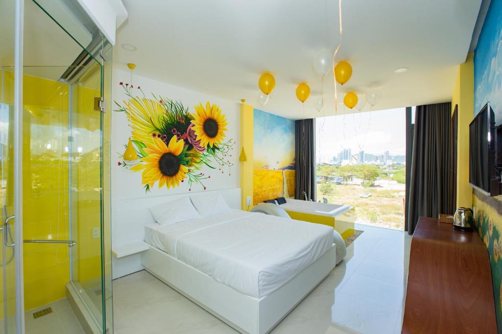 Postel nebo postele na pokoji v ubytování Romely Hotel Nha Trang