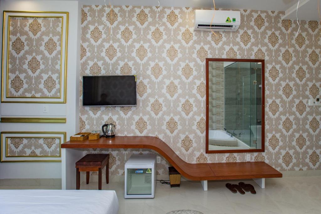 TV a/nebo společenská místnost v ubytování Romely Hotel Nha Trang