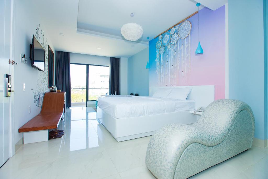 Postel nebo postele na pokoji v ubytování Romely Hotel Nha Trang