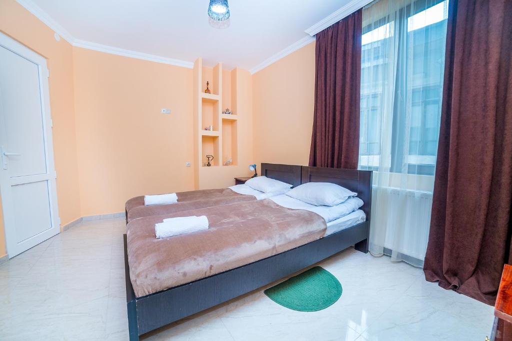 Postel nebo postele na pokoji v ubytování hotel Gallery