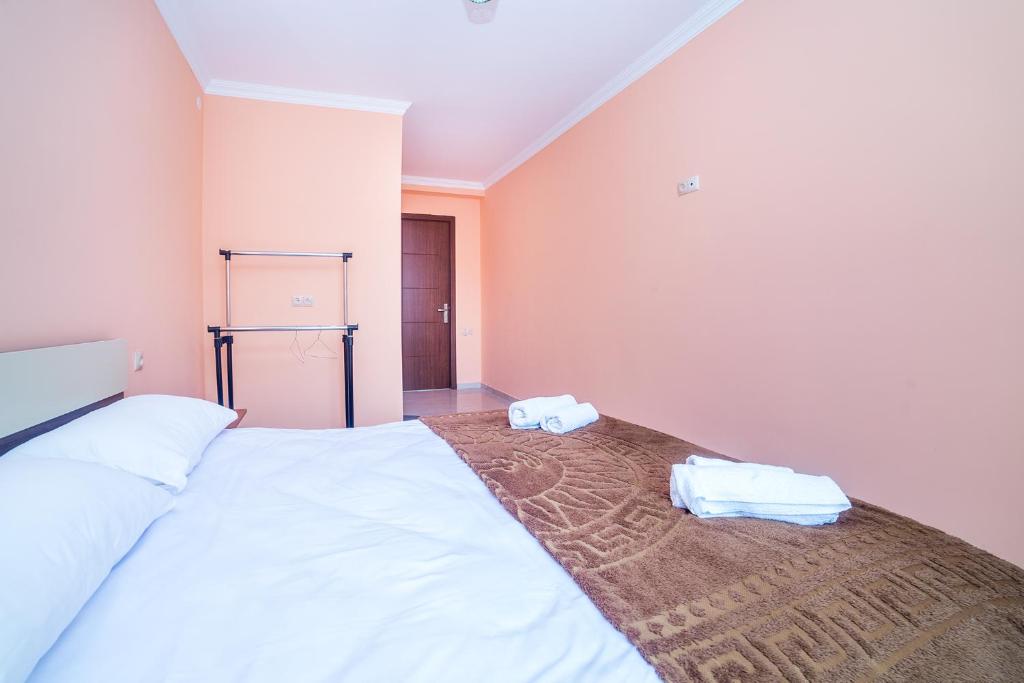 Postel nebo postele na pokoji v ubytování hotel Gallery