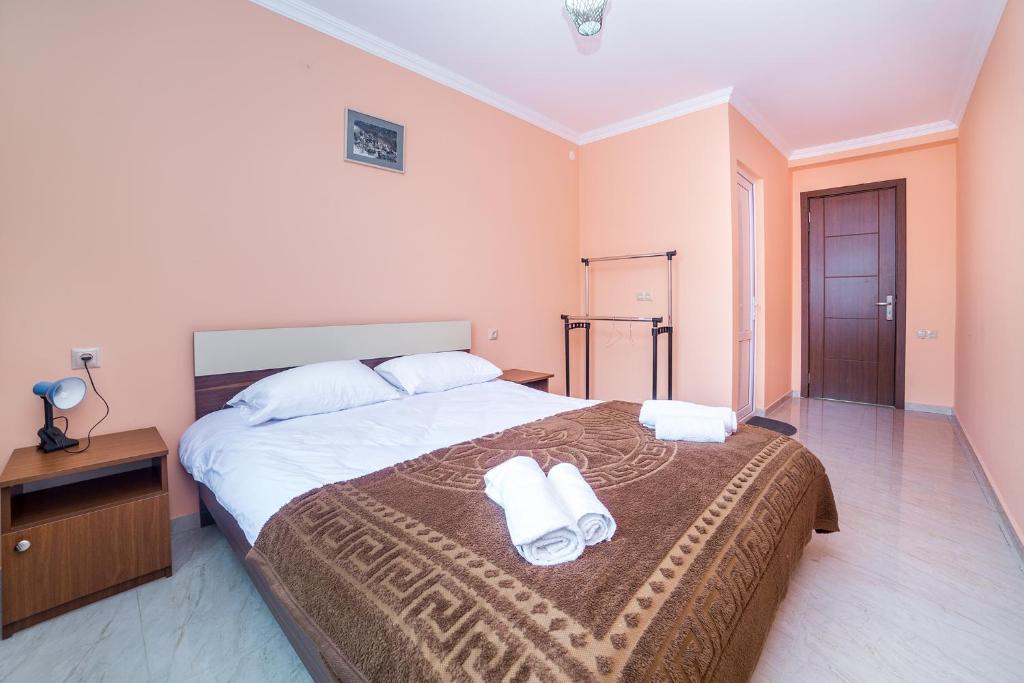 Postel nebo postele na pokoji v ubytování hotel Gallery