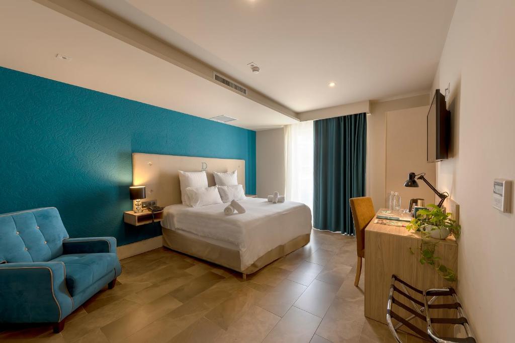 Postel nebo postele na pokoji v ubytování Ddream Hotel