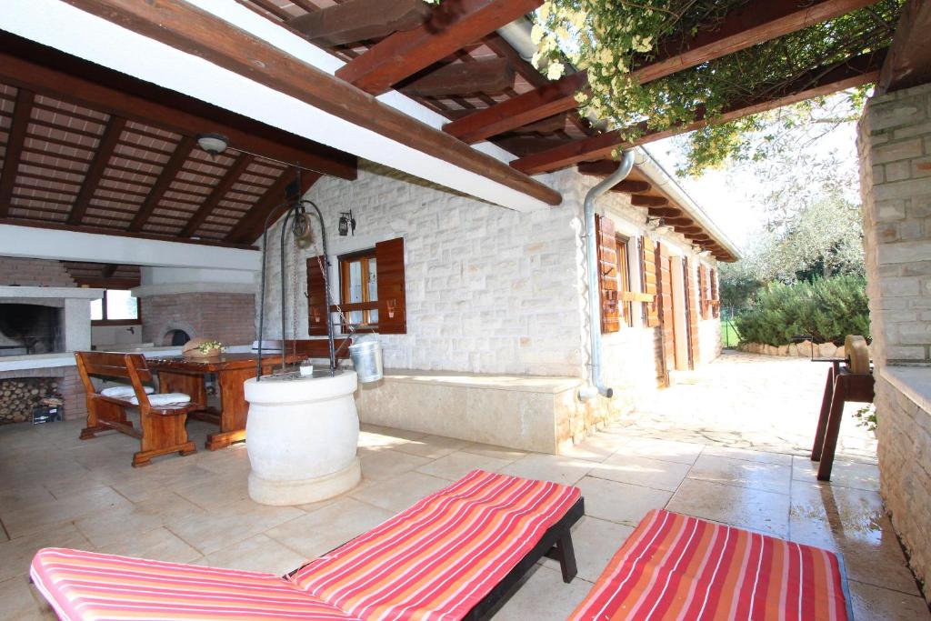 Posezení v ubytování Holiday House San Pruti