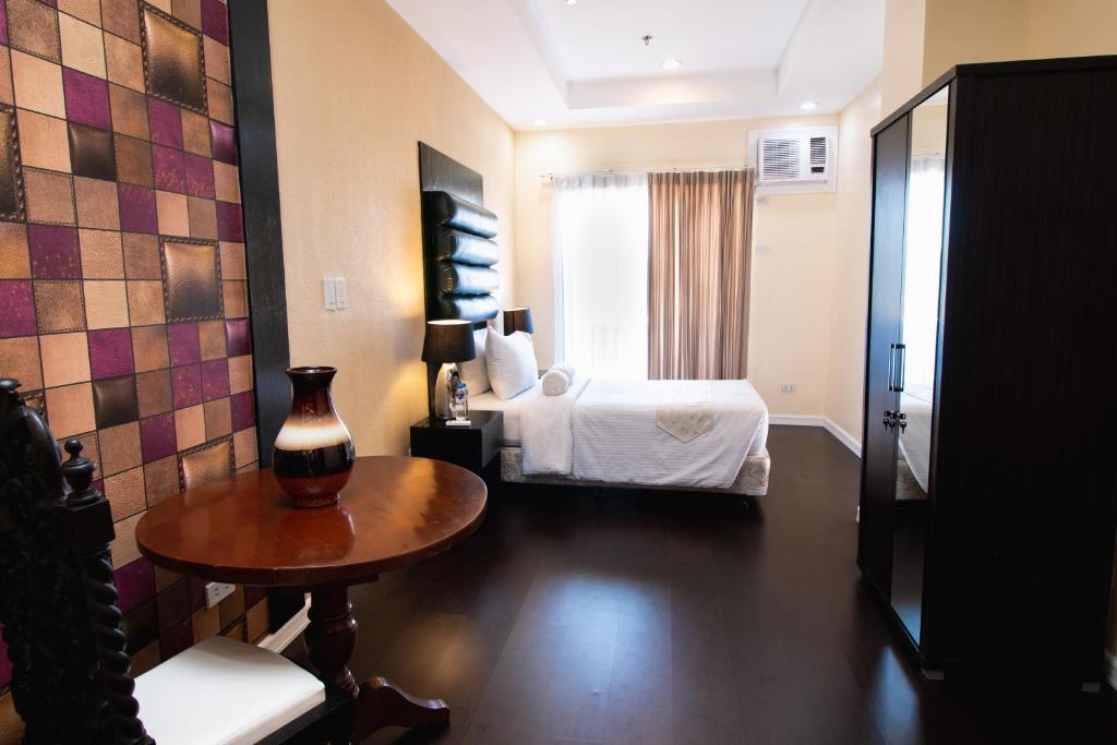 Postel nebo postele na pokoji v ubytování Sierra Hotel