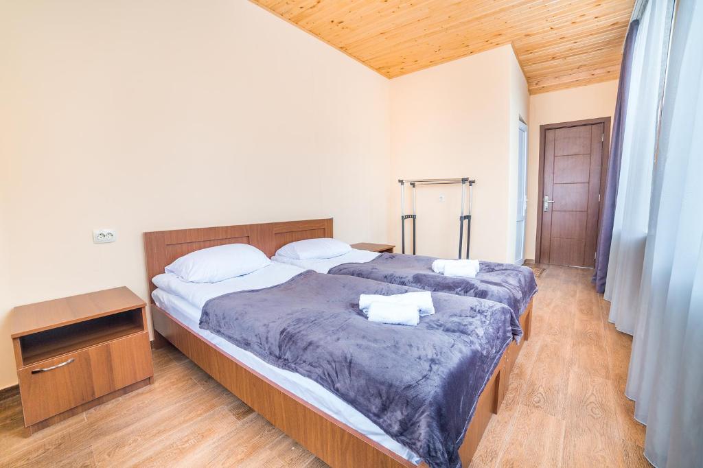 Postel nebo postele na pokoji v ubytování hotel Gallery