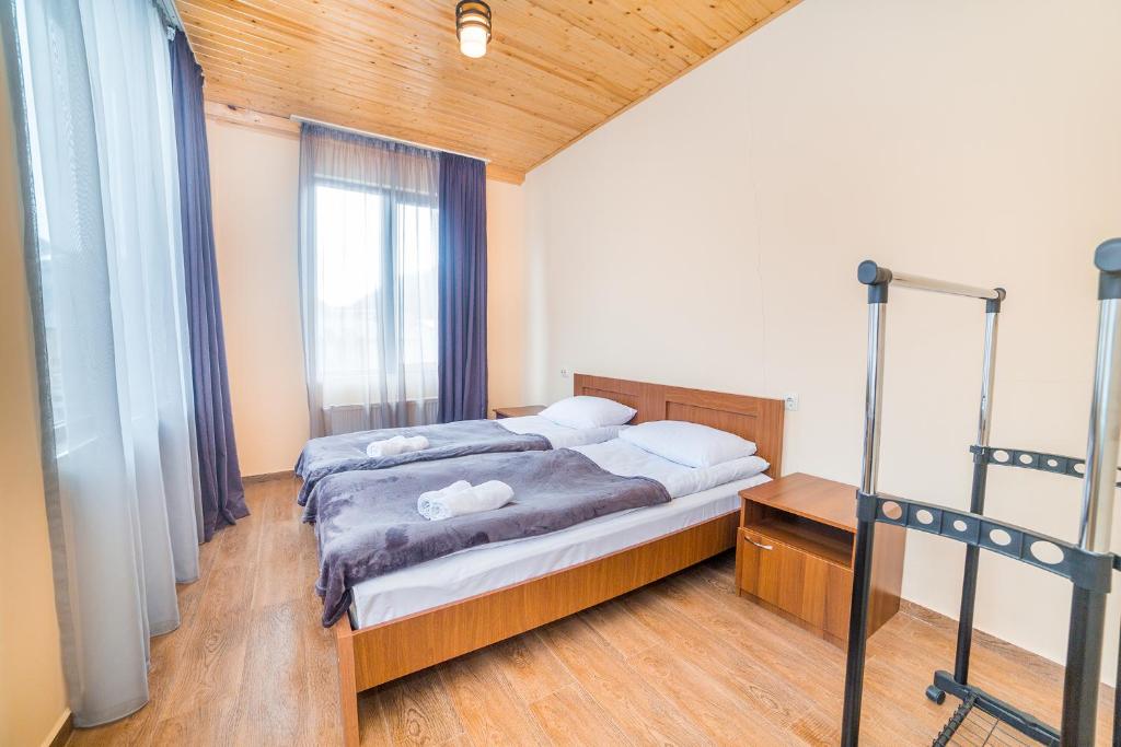 Postel nebo postele na pokoji v ubytování hotel Gallery