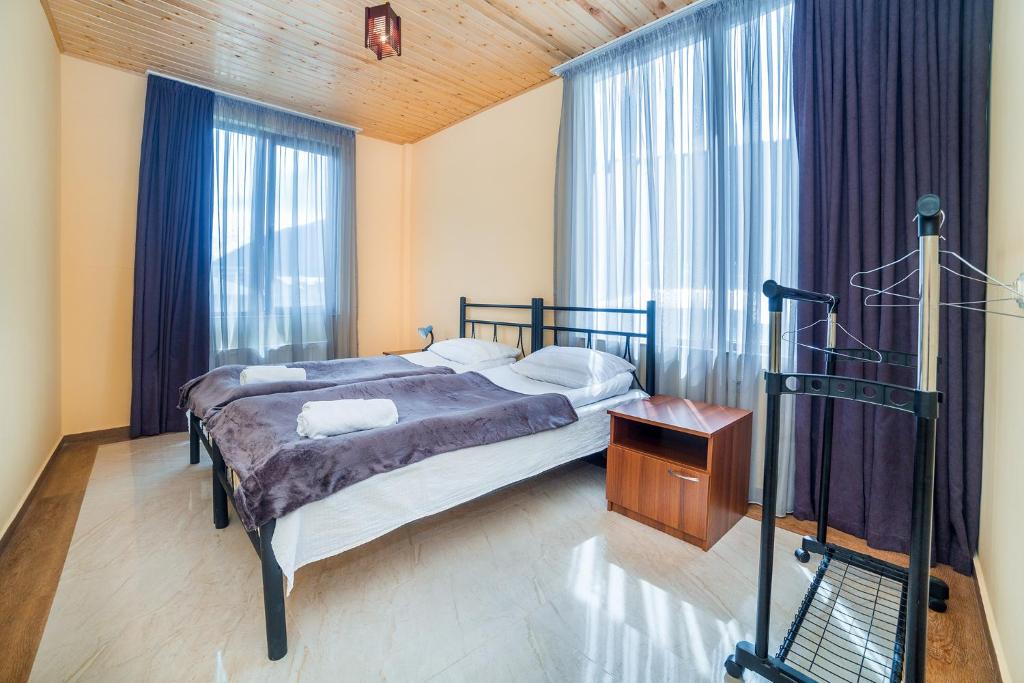 Postel nebo postele na pokoji v ubytování hotel Gallery