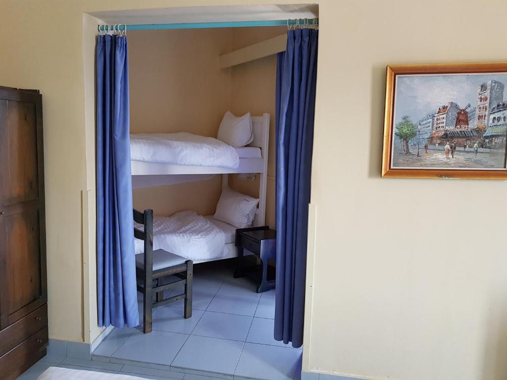Voodi või voodid majutusasutuse Hotel Miramare toas