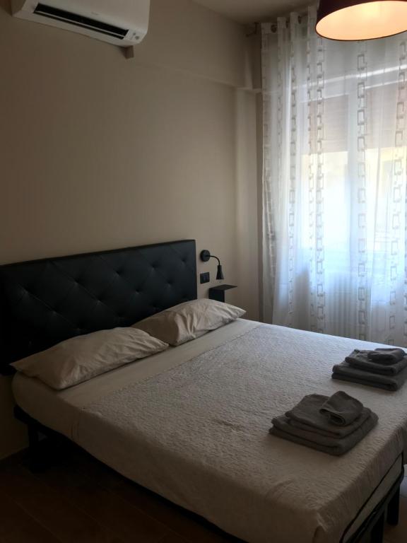 Postel nebo postele na pokoji v ubytování Riva Reno 4 Rooms