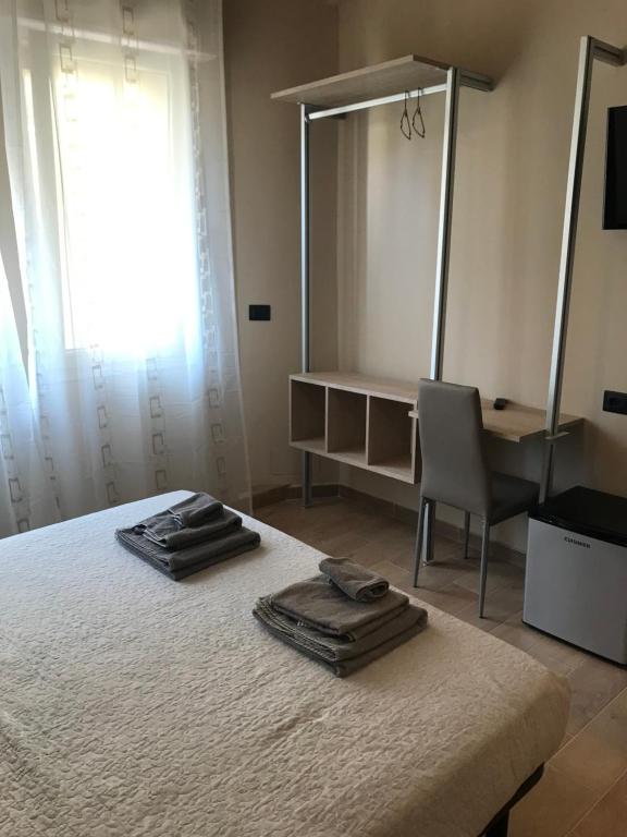 Postel nebo postele na pokoji v ubytování Riva Reno 4 Rooms