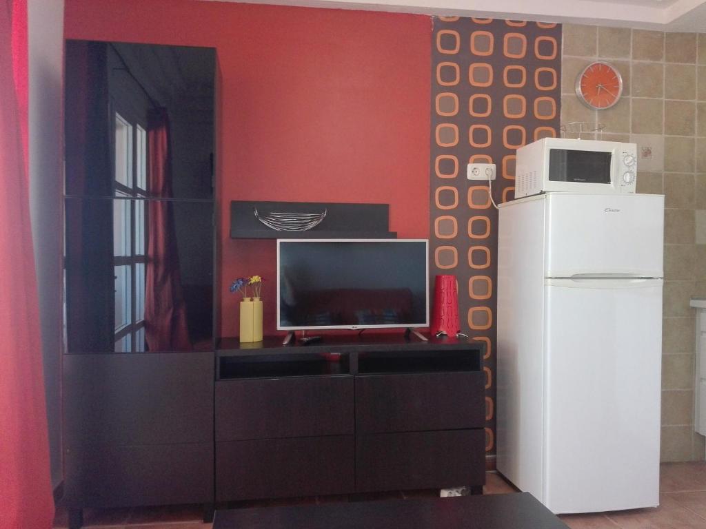 Kuchyň nebo kuchyňský kout v ubytování Orlando Apartments